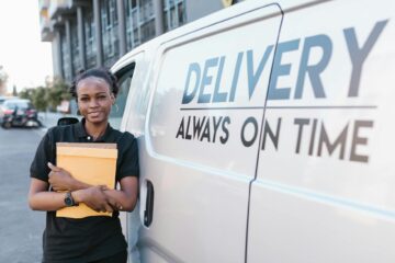 a woman holding document parcels